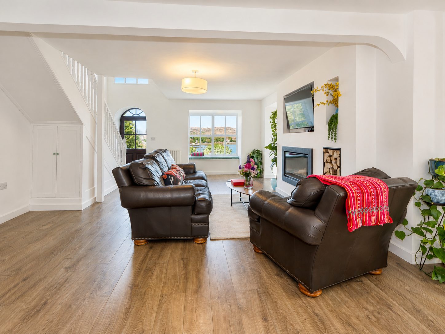 Sitting room with fireplace and view toward the garden