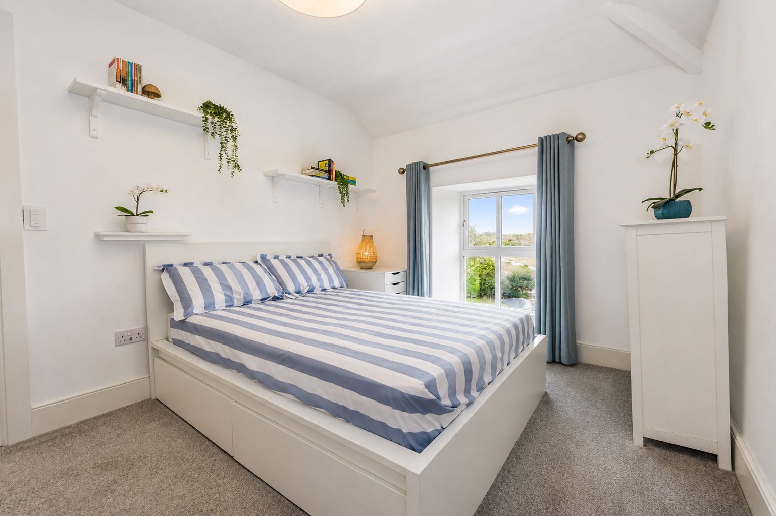 Double bedroom with coastal view