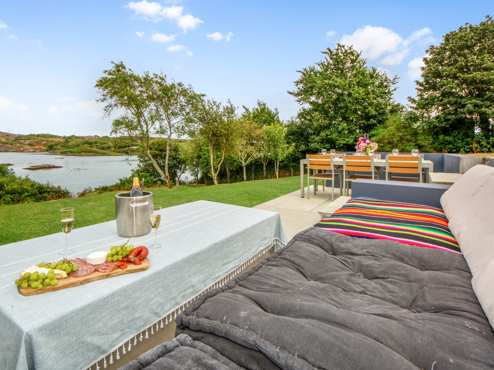 Sunken outdoor seating overlooking Toormore Cove