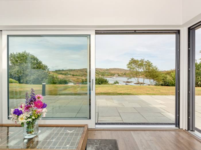 View through sliding doors to Toormore Cove